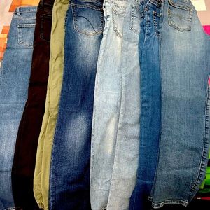 8 pair of pants ranging from size 11-14